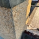 Restored chimney stack with new pebble dash and smooth rendered chimney crown in Calverley West Yorkshire.